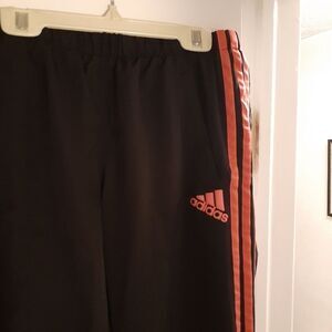 Adidas track pants. black with pink stripes. m l athletic athleisure comfort